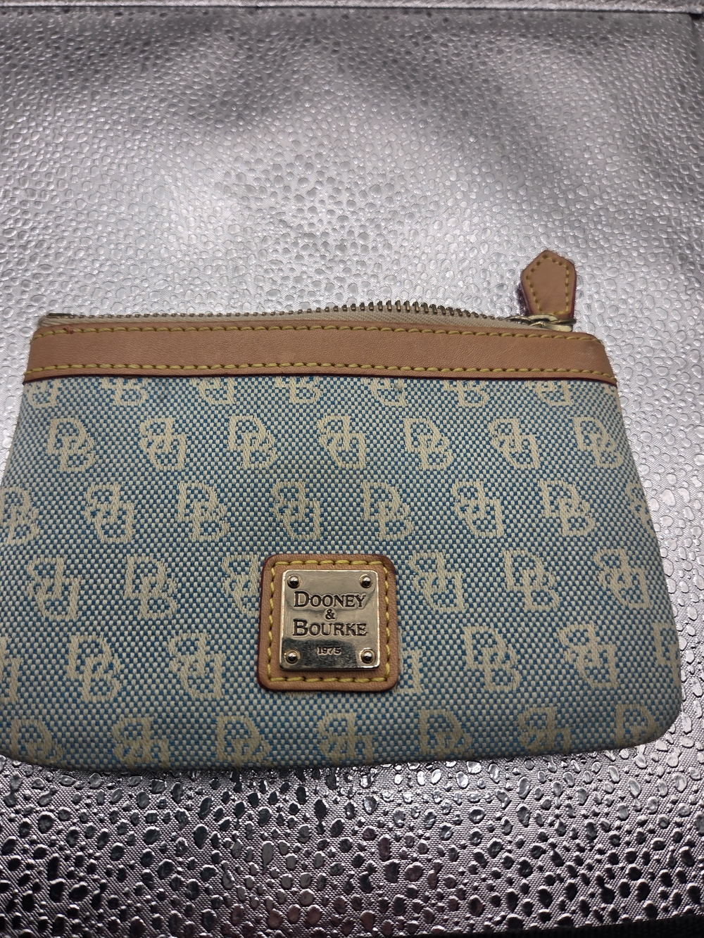 Dooney & Bourke light blue DB logo zip pouch with tan trim